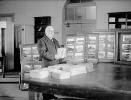 S. D. Butcher working at his collection at the University of Nebraska, 1916