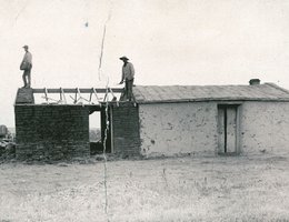 Building a Sod House in Western Nebraska; home of Frank Roach, Keith County, about 1890