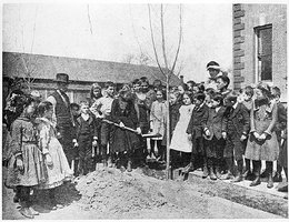 Nebraska children planting a tree for Arbor Day, circa late 1800s