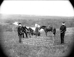 Photo faked for newspaper article of the time: "Settlers taking the law in their own hands, cutting 15 miles of the Brighton Ranch fence in 1885"