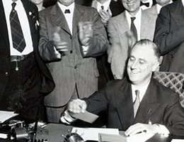 President Franklin D. Roosevelt signing the Tennessee Valley Authority Act in 1933