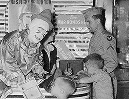 Clown selling war bonds at Gold’s department store in Lincoln