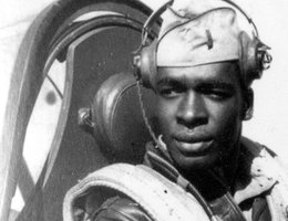 Lieutenant Colonel Paul Adams, Tuskegee Airman, 302nd Fighter Squadron, in the cockpit of his P40 plane