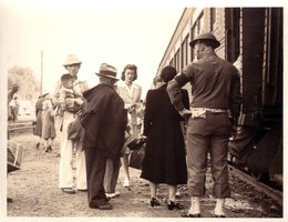 Japanese Americans are inspected as they board a train in Woodland, California bound for a relocation camp in May, 1942