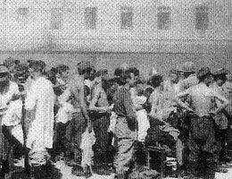 Long provided this photo of concentration camp victims lining up to receive clean, new clothes after the Allies liberated their camp