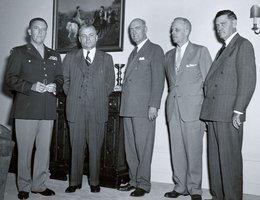 Berlin, Germany, 28 June, 1947; Nebraskan Justice E. F. Carter (second from left) is one of 3 judges on the right receiving letter of appointment for the 5th Military Tribunal, Nuremberg