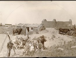 William Garlock (at left with the shovel) is probably digging the well for the Jacob Graff house near West Union in Custer County, 1888